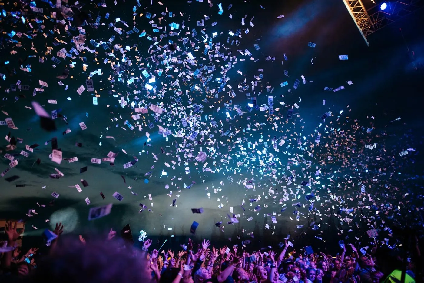 Confetti falling over a nightclub dance floor
